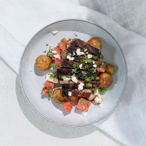 Grillad fläskkarré med kulpotatis och melonsallad